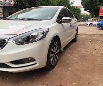 Kia K3 1.6 MT 2014 - Cần bán xe Kia K3 1.6 MT sản xuất năm 2014, màu trắng, giá 425tr