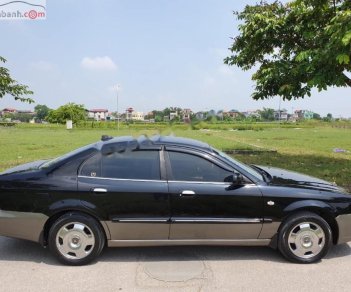 Daewoo Magnus   2004 - Bán xe cũ Daewoo Magnus 2.5 AT 2004, màu đen