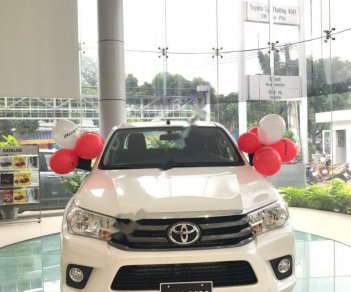 Toyota Hilux   2019 - Bán Toyota Hilux 2.4E 4x2 MT sản xuất năm 2019, màu trắng, nhập khẩu 