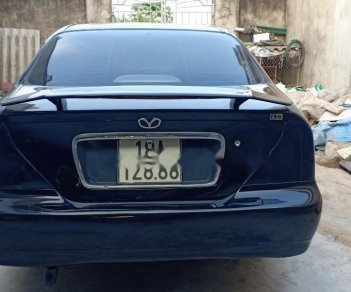 Daewoo Magnus   2004 - Cần bán lại xe Daewoo Magnus 2.4 AT đời 2004, màu đen, giá 118tr