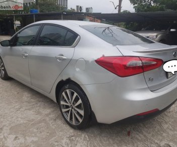 Kia K3   2014 - Bán xe cũ Kia K3 2.0 AT sản xuất năm 2014, màu bạc