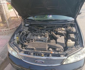 Ford Laser   2004 - Bán xe cũ Ford Laser 2004, màu đen, 176 triệu