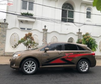 Toyota Venza 2010 - Cần bán lại xe Toyota Venza AT năm sản xuất 2010, màu vàng, xe nhập chính chủ