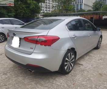 Kia K3   2014 - Bán xe cũ Kia K3 2.0 AT sản xuất năm 2014, màu bạc