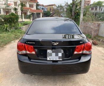 Daewoo Lacetti   2010 - Bán xe Daewoo Lacetti MT đời 2010, màu đen, nhập khẩu 