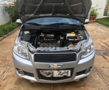 Chevrolet Aveo 2015 - Cần bán gấp Chevrolet Aveo sản xuất 2015, màu bạc