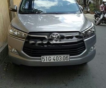 Toyota Innova 2017 - Cần bán lại xe Toyota Innova MT sản xuất 2017, màu bạc số sàn, 648tr