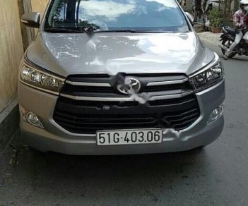 Toyota Innova 2017 - Cần bán lại xe Toyota Innova MT sản xuất 2017, màu bạc số sàn, 648tr