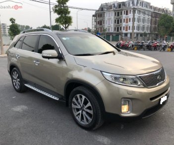 Kia Sorento DATH 2.2L 2WD 2014 - Cần bán lại xe Kia Sorento DATH 2.2L 2WD đời 2014, màu vàng chính chủ, 725tr