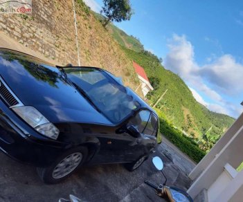 Ford Laser Delu 1.6 MT 2001 - Gia đình bán Ford Laser Delu 1.6 MT sản xuất 2001, màu đen 