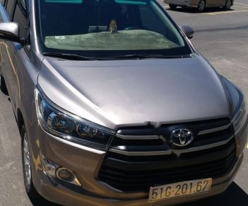 Toyota Innova 2016 - Bán Toyota Innova 2.0E năm sản xuất 2016, xe còn mới nguyên