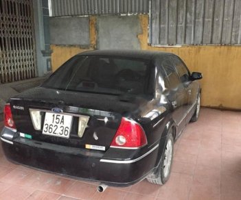 Ford Laser 2004 - Cần bán Ford Laser 2004, màu đen số tự động xe còn mới nguyên