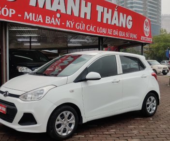 Hyundai Grand i10 1.0 MT 2014 - Cần bán Hyundai Grand i10 1.0 MT sản xuất 2014, màu trắng, nhập khẩu chính hãng 