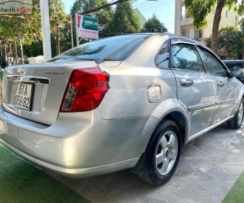 Chevrolet Lacetti 2012 - Cần bán lại xe Chevrolet Lacetti sản xuất năm 2012, màu bạc xe gia đình