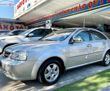 Chevrolet Lacetti 2012 - Cần bán lại xe Chevrolet Lacetti sản xuất năm 2012, màu bạc xe gia đình