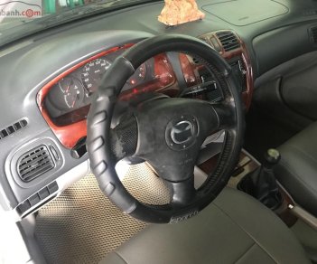 Mazda 323 2003 - Cần bán Mazda 323 đời 2003, màu bạc giá cạnh tranh