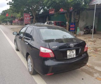 Toyota Vios   2010 - Cần bán gấp Toyota Vios sản xuất 2010, màu đen, nhập khẩu nguyên chiếc