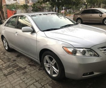 Toyota Camry  LE  2009 - Cần bán lại xe Toyota Camry LE năm 2009, màu bạc, xe nhập