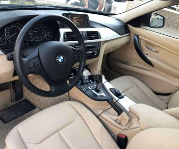 BMW 3 Series    2014 - Bán ô tô BMW 3 Series sản xuất 2014, màu đen, xe nhập như mới