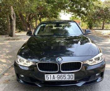 BMW 3 Series    2014 - Bán ô tô BMW 3 Series sản xuất 2014, màu đen, xe nhập như mới