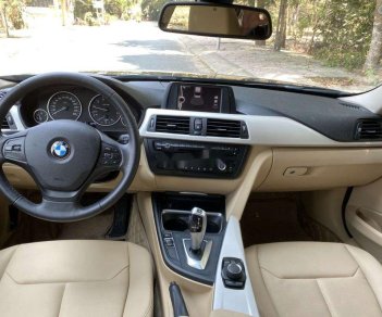 BMW 3 Series    2014 - Bán ô tô BMW 3 Series sản xuất 2014, màu đen, xe nhập như mới