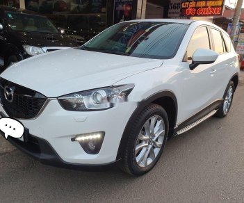 Mazda CX 5   2015 - Cần bán lại xe Mazda CX 5 đời 2015, màu trắng, 680 triệu