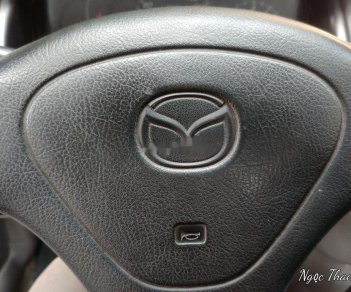 Mazda 323   2002 - Cần bán lại xe Mazda 323 sản xuất năm 2002, 115 triệu