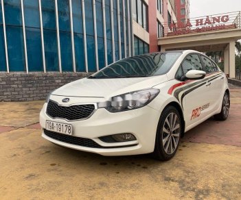 Kia K3 2014 - Cần bán xe Kia K3 1.6 MT đời 2014, màu trắng xe gia đình, giá tốt