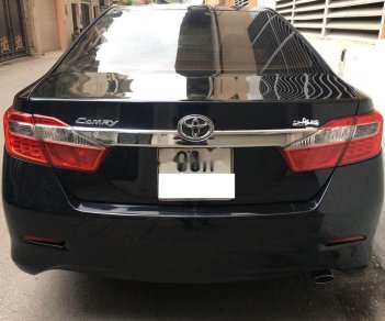 Toyota Camry   2014 - Bán Toyota Camry 2.0E đời 2014, màu đen, biển Hà Nội