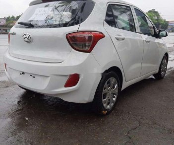 Hyundai Grand i10     2014 - Cần bán Hyundai Grand i10 sản xuất 2014, màu trắng, xe nhập chính chủ, giá tốt