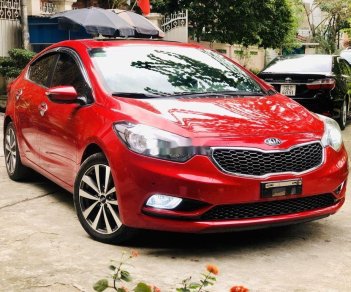 Kia K3 2015 - Cần bán gấp Kia K3 2.0AT sản xuất 2015, màu đỏ