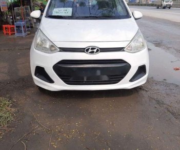 Hyundai Grand i10     2014 - Cần bán Hyundai Grand i10 sản xuất 2014, màu trắng, xe nhập chính chủ, giá tốt