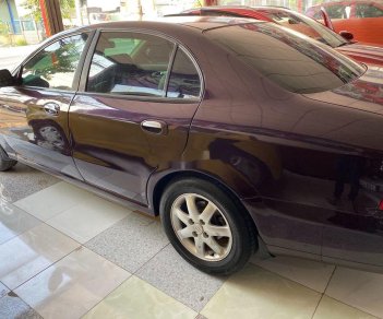 Daewoo Magnus   2004 - Cần bán gấp Daewoo Magnus đời 2004, màu đỏ, nhập khẩu nguyên chiếc, 92 triệu