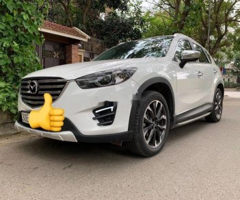 Mazda CX 5 2017 - Cần bán gấp Mazda CX 5 sản xuất 2017, màu trắng như mới, 765tr