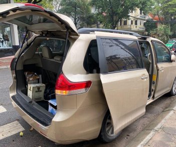 Toyota Sienna 2010 - Cần bán xe Toyota Sienna năm 2010, màu vàng, xe nhập