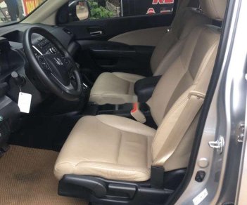 Honda CR V 2015 - Cần bán lại xe Honda CR V 2.0 AT sản xuất năm 2015, màu bạc số tự động, giá chỉ 655 triệu