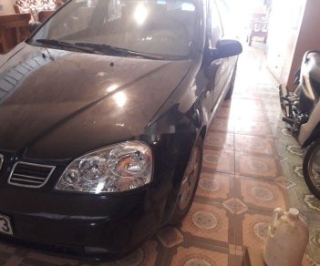 Daewoo Lacetti 2004 - Cần bán gấp Daewoo Lacetti đời 2004, màu đen