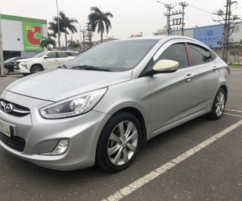 Hyundai Accent 2014 - Cần bán xe Hyundai Accent bản số sàn sản xuất năm 2014, màu bạc