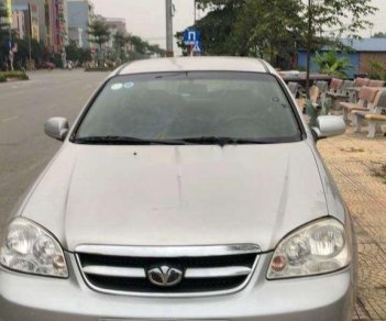 Daewoo Lacetti 2009 - Cần bán gấp Daewoo Lacetti sản xuất 2009, màu bạc