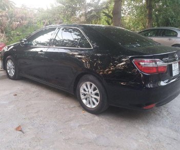 Toyota Camry 2016 - Bán Toyota Camry năm 2016, màu đen, giá chỉ 730 triệu