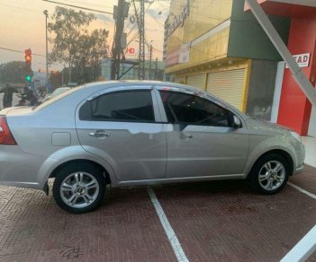 Chevrolet Aveo   LT   2018 - Cần bán gấp Chevrolet Aveo LT năm 2018, màu bạc