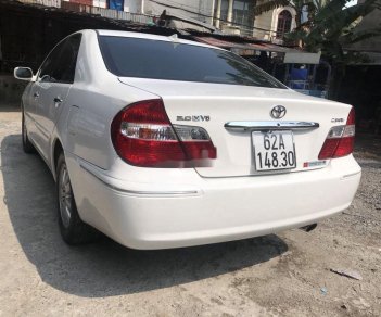 Toyota Camry 2004 - Cần bán xe Toyota Camry AT đời 2004, màu trắng, giá chỉ 275 triệu