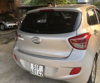 Hyundai Grand i10 1.2 AT 2015 - Bán Hyundai Grand i10 1.2 AT đời 2015, màu bạc, mẫu hatchback