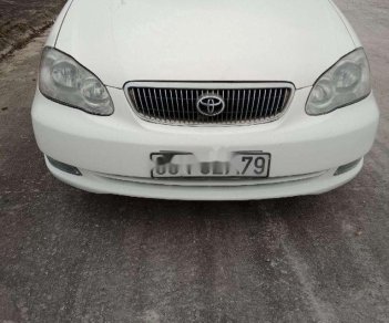 Toyota Corolla 2002 - Cần bán lại xe Toyota Corolla 1.3 sản xuất năm 2002, màu trắng xe gia đình