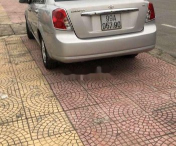 Daewoo Lacetti 2009 - Cần bán gấp Daewoo Lacetti sản xuất 2009, màu bạc