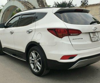 Hyundai Santa Fe 2016 - Bán xe Hyundai Santa Fe 2016, màu trắng chính chủ, 875 triệu