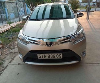 Toyota Vios   2014 - Bán Toyota Vios sản xuất 2014, màu vàng, xe gia đình