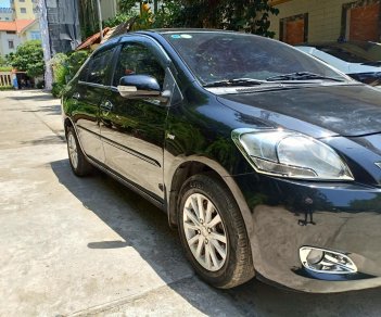 Toyota Vios 2014 - Chính chủ cần bán chiếc Toyota Vios 1.5E 2014, màu đen, giá cực rẻ