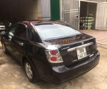 Daewoo Lacetti   2011 - Cần bán gấp Daewoo Lacetti năm sản xuất 2011, màu đen giá cạnh tranh