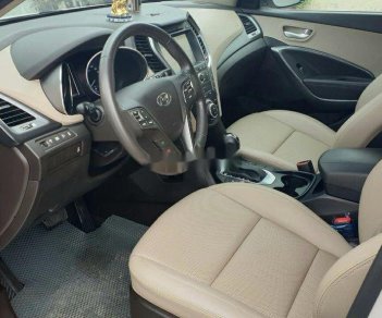 Hyundai Santa Fe 2016 - Bán xe Hyundai Santa Fe 2016, màu trắng chính chủ, 875 triệu